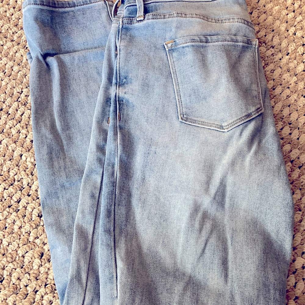 Light blue, power straight jeans, loose but fitting, no torn fabric or stains